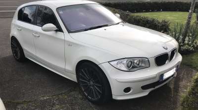Report 71826e38 Hjd613 2006 Bmw 116i In Black